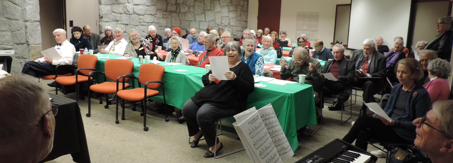 group at a christmas party singing